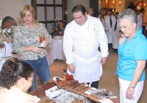 2007 Super Bowl - Emeril Lagasse browsing hand-rolled cigars       